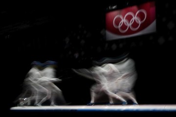 世界杯赛程-日媒：菅义伟不考虑取消奥运 男重团体金牌“悲愿”